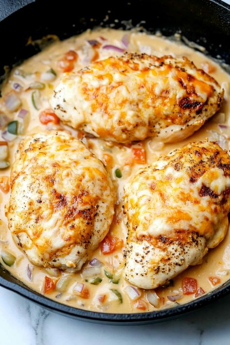 Indulge in a delicious dinner with this mouthwatering baked queso chicken recipe! Juicy chicken breasts smothered in gooey melted cheese, spicy jalapenos, and flavorful seasonings. This easy-to-make dish is perfect for busy weeknights or weekend gatherings. Serve it alongside rice, salad, or roasted veggies for a complete meal the whole family will love. Delicious Chicken Breast Recipes, Mexican Food Dishes, Marinating Chicken Breast, Zesty Italian Dressing, Creamy Mushroom Sauce, Roasted Chicken Breast, Sauteed Vegetables, Cheesy Chicken, Boneless Chicken Breast