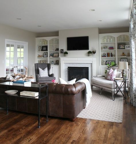 living room with my marble fireplace and brown couch Contemporary Living Room With Fireplace, Family Friendly Living Room, Brown Leather Couch, Brown Leather Sofa, Living Room Update, Casas Coloniales, Mid Century Modern Living Room, Leather Couch, Furniture Layout