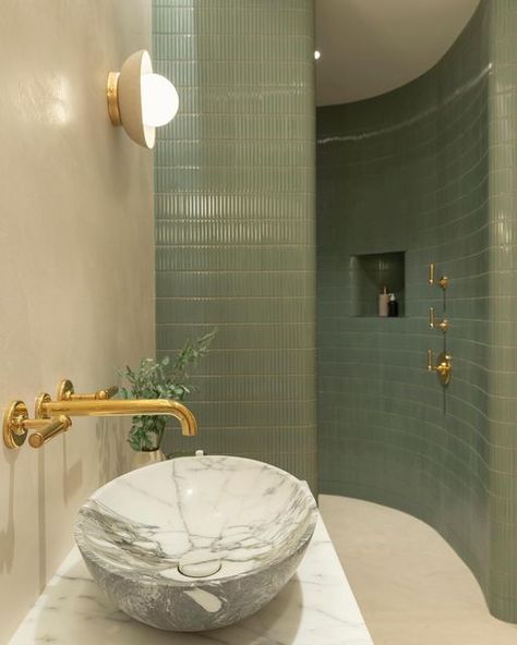 Claybrook UK on Instagram: "Client Focus: @luxeprojectslondon The guys from @luxeprojectslondon describe this as being ‘quite possibly our favourite en-suite shower room ever’ and we can see why. The use of our Zeze kit-kat style glazed mosaics on the curving wall has been executed brilliantly, and is achieved in a straightforward way as the tiles are on a mesh backing. The olive-green Bonsai colourway pairs so elegantly with the stone and marble, and has even been used within the recessed storage. Try our East Haven marble tiles alongside the Zeze; they look lovely together. Free samples of the mosaics and marble collections are available to order easily from our website. #claybrookstudio #claybrook #claybrooktiles" Curved Shower Wall, Recessed Storage, Green Tile Bathroom, En Suite Shower Room, Guest Toilet, Curved Walls, Mosaic Wall Tiles, Green Tile, Window Dressings