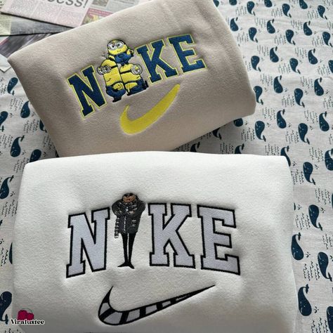 Vintage Minions And Gru Nike Embroidered Sweatshirts, Nike Embroidery Matching Check more at https://viralustee.com/product/vintage-minions-and-gru-nike-embroidered-sweatshirts-nike-embroidery-matching/ Diy Nike Sweatshirt Iron On Patches, Nike Sweatshirts Diy, Matching Nike Hoodies, Custom Nike Sweatshirt, Bestie Sweatshirts, Nike Cartoon, Nike Stuff, Nike Hoodies, Sweatshirts Nike