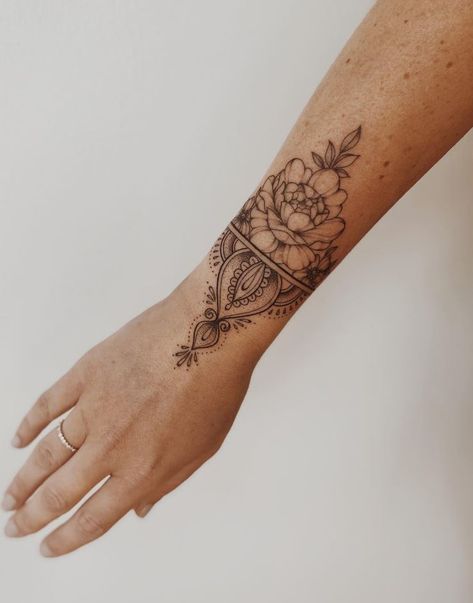 Floral Mandala Wrist Tattoo, Women’s Wrist Wrap Tattoo, Wrist Tattoo Unique, Forearm Bracelet Tattoo Women, Ornamental Tattoo Wrist, Women Wrist Tattoos Ideas, Outside Wrist Tattoos For Women, Wrist Wrap Tattoos For Women, Inner Elbow Tattoos For Women