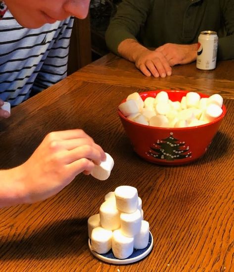 Christmas Game: Stack the Marshamallows Christmas Games For Family Marshmallow, Marshmallow Christmas Game, Marshmallow Christmas Games, Big Family Christmas Games, Marshmallow Games For Adults, Oven Mitt Christmas Game, Cup Christmas Game, Marshmallow Stacking Game, Christmas Table Games