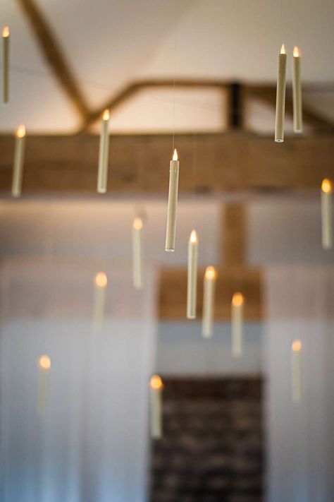 Image shows a Harry Potter themed wedding with hanging candles throughout the ceiling at Farbridge Barns. Photo credit Lucy Davis Photography Floating Candles Wedding Harry Potter, Harry Potter Candle Holder, Halloween Decor Hanging From Ceiling, Candle Hanging From Ceiling, Ceiling Floating Candles, Floating Candle Harry Potter, Hanging Candles From Ceiling, Hanging Floating Candles, Harry Potter Lights From Ceiling