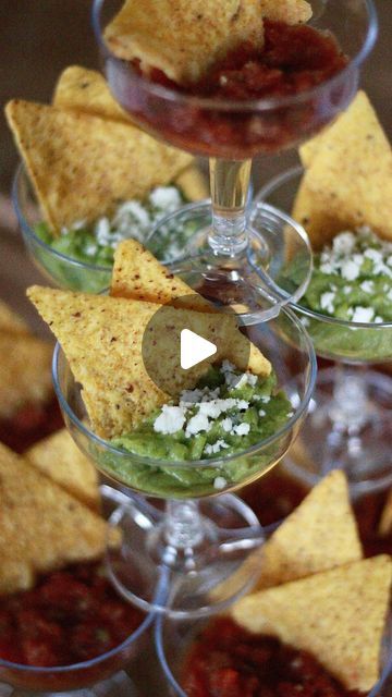 Megan Ruffles on Instagram: "Please read this caption👇🏻  Comment link to shop these stackable champagne glasses.   There are so many things you could do with these. Let me know if you want more ideas. Would be fun for a graduation party, bridal shower, baby shower, etc.   Please note: the chips get soggy fairly quickly in the salsa so add your chips right before serving or just do chips and guacamole. The chips don’t get soggy in guac like they do in salsa. You could also fill each glass with salsa only and have  a big bowl of chips on the side for guests to add as they wish.   #bridalshowerfood #graduationpartyideas #graduationpartyfood #babyshowerfood #cincodemayoparty" Appetizers In Champagne Glasses, Chips And Salsa Wedding, Shotcuterie Ideas, Shotcuterie Party, Chips And Guacamole, Guacamole Chips, Friendsgiving Dinner Party, Graduation Party Foods, Nacho Chips