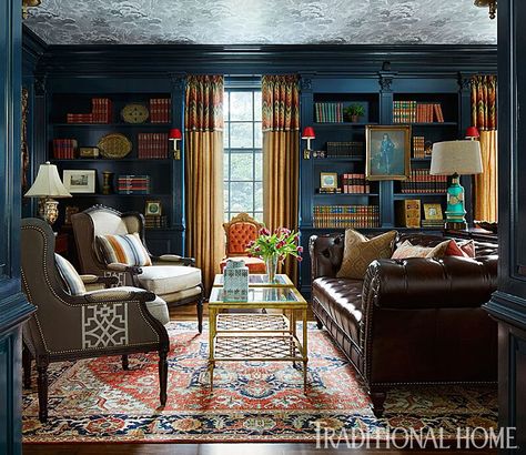 Rich Color and Lively Patterns Bring New Energy to This Historic Detroit Home Shimmery Wallpaper, Study Den, Historic Detroit, Painted Bookshelves, Brown Leather Couch, Library Study, Navy Walls, Brown Couch, Brown Carpet