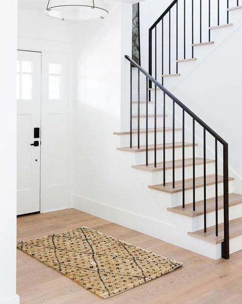 5 Rules For Using Black Accents In Your Home - Anita Yokota Banister Remodel, Black Stair Railing, Metal Stair Railing, Black Stairs, Hardwood Stairs, Diy Staircase, Iron Stair Railing, Stairs In Living Room, Wrought Iron Stairs