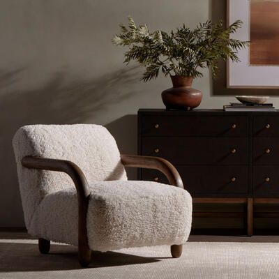 The new Aniston chair contrasts plush faux Mongolian shearling with a chunky wire-brushed wood frame for a warm, vintage feel Natural Chair, Ottoman Table, Four Hands, Burke Decor, Nebraska Furniture Mart, Floor Lamp Table, Accent Chair, Sofa Chair, Headboards For Beds