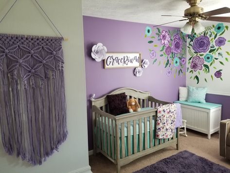 Purple And Blue Nursery Girl, Purple Flower Nursery Ideas, Baby Girl Nursery Room Ideas Purple, Purple And Green Nursery, Purple Nursery Ideas, Green Floral Nursery, Purple Flower Nursery, Purple Baby Nursery, Blue Floral Nursery