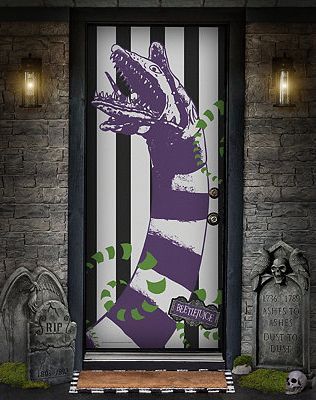 Transform the look of your house in one simple step with this officially licensed Beetlejuice door hanging! You’ll love watching your guests react to the giant sandworm on your door as they approach your house. It’s showtime! Officially licensed Dimensions: 37” W x 80” L Material: Polyester, spandex Care: Machine wash Imported Note: Fits most standard exterior doors Beetlejuice Door Decoration, Beetlejuice Door, Halloween Indoor Decorations, Halloween Door Decorations Classroom, Beetlejuice Party, Halloween Juice, Spirit Halloween Costumes, Beetlejuice Halloween, Movie Decor