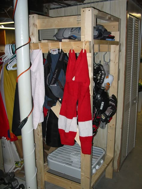 This is what I've been looking for--easy and inexpensive to make drying rack for my two hockey players' stinky wet gear. Diy Hockey Drying Rack, Hockey Gear Drying Rack, Hockey Equipment Drying Rack, Hockey Gear Storage, Hockey Drying Rack, Hockey Equipment Storage, Hockey Organization, Backyard Ice Rink, Hockey Diy