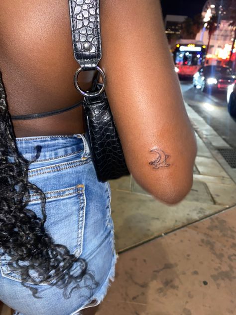 Minimalist Tattoo Black Skin, Moon Tattoo On Black Women, Moon Tattoo Upper Arm, Moon Tattoo Inner Arm, Moon Tattoo Back Of Arm, Small Moon Tattoo Placement, Moon Tattoo Placement, Moon Tattoo Arm, Moon Arm Tattoo