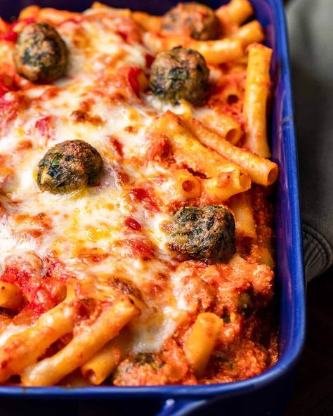 Baked ziti with meatballs is a comforting dish that combines pasta, tiny meatballs, marinara, ricotta, Pecorino Romano, and mozzarella that's baked until bubbly and golden. #bakedzitiwithmeatballs #comfortfood #bakedpasta Ziti With Meatballs, Baked Ziti With Meatballs, Tiny Meatballs, Meatballs Marinara, Mushroom Pasta Bake, Baked Ziti With Ricotta, Sip And Feast, Ziti Recipe, Cheese Stuffed Meatballs