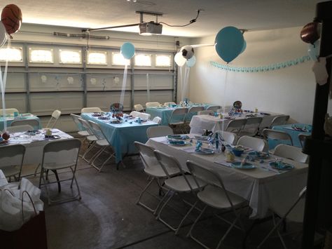 Sports baby shower Small Garage Party Set Up Ideas, Garage Baby Shower Ideas, In Home Baby Shower Setup, Cheap Baby Shower Table Cloth, Sports Themed Baby Shower Ideas For Boys, Garage Party Set Up Ideas, Sports Baby Shower Decorations, Vase Lights, Baby Shower Sports