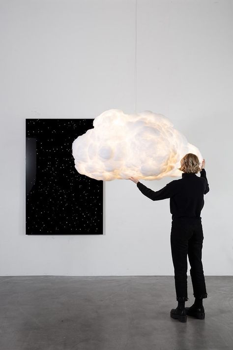 Interactive Cloud Lamp Richard Clarkson Studio Brighten up your home with this Interactive #Cloud #lamp—a fluffy #cumulous cloud with hidden #LED #lights that sync to your music. Designed by Richard Clarkson Studio, Interactive Cloud comes in a range of sizes and functions. Suspend it from the #ceiling or group multiple clouds together to recreate the sky indoors. Wherever it is displayed, Interactive Cloud unites light and sound for a stunning effect. #indoor #decoration #inspiration #art Lab Decor, Laser Etched Glass, 3 Paintings, Cloud Ceiling, Origami Lamp, Cloud Lamp, Minimalist Tables, Cloud Lights, Celestial Art