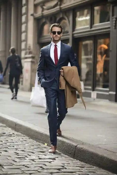 Prefer a more classic outfit? No problem, feel free to wear a dark blue business suit, white shirt, tie, but be sure to complete the look with a brown coat for cold weather and the same color shoes. Stylish sunglasses will add a relaxed mood. A great option for both business meetings and going to a restaurant.  #fashion #suit #blazer #jacket #elegant A Man In A Suit, Man In A Suit, Mens Fashion Work, Formal Mens Fashion, Mens Fashion Photography, Navy Suit, Men’s Suits, Men Style Tips, Mens Fashion Suits