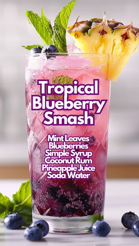 If you are craving for a refreshing and fruity drink, the Tropical Blueberry Smash is a perfect mix of blueberry, mint, and lime with a splash of coconut rum and pineapple juice. This cocktail is topped with soda water, creating a perfect balance of sweetness and fizz. Garnish with fresh fruit and mint for an eye-catching presentation. #tropicalblueberrysmash via @mybartender Mixed Drinks Alcoholic Sweet, Blueberry Cocktails, Rum And Pineapple Juice, Coconut Rum Cocktails, Blueberry Drink, Coconut Rum Drinks, Fruity Mixed Drinks, Blueberry Cocktail, Water Cocktails