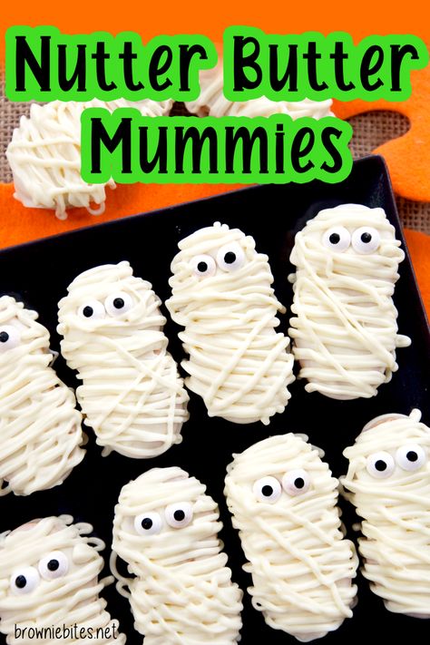 recipe for no bake nutter butter mummy cookies for halloween Halloween Sweet Treats For Kids School, Nutter Butter Cookies Ideas, Nutter Butter Cookies Decorated, Nutter Butter Ghosts, Butter Butter Mummies, Nutter Butter Dipped In Chocolate, Nutter Butter Mummies, Nutter Butter Recipes, Nutter Butter Halloween