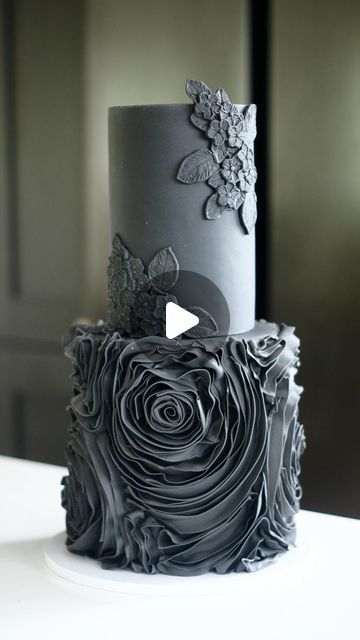 Cake Stuff on Instagram: "We told you this was a special one - if you liked what you saw from our sneak peek last week, sit back and enjoy the full reveal! 🤩 Using our black @couturesugarpaste, @clairelawrencecakedesign created all the elements that made this cake so stunning! The flawless tiers, the floral moulding (using the @karen_davies_sugarcraft Brush Embroidery mould!) and those spectacular ruffle roses. One paste, so many options! 🖤  Save this for later, for the ultimate black wedding cake inspo! And shop Couture now at Cake Stuff. 💕 . . . #weddingcake #weddingcakeinspo #blackcake #blackweddingcake #cakestuff #bakersofinstagram #bakersofinsta #bakerslife #bakersgonnabake #bakerybusiness #cakebusiness #cakebusinessadvice #cakeartists #bakingtools #cake_trends #cakedesigner #caked Cake Moulds, Black Rose Cake, Black Roses Cake, Black Rosette Cake, Black Rose Cake Birthday, Ruffle Cake Design, White Wedding Cake Black Flowers, Chocolate Cake With Roses On Top, Ruffle Cake Tutorial