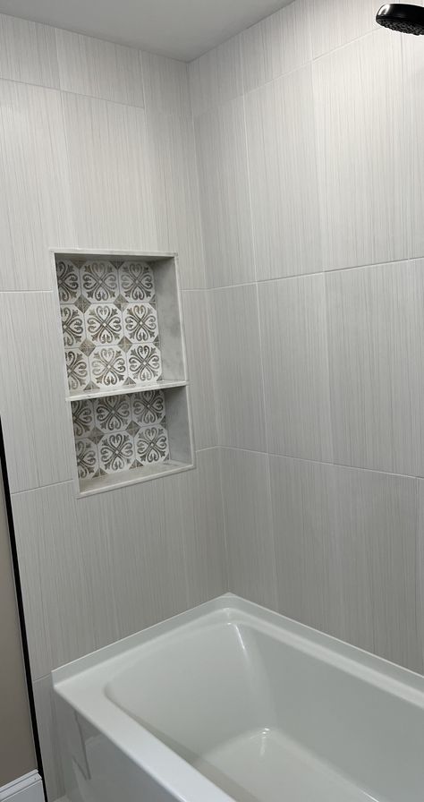 Bathtub Shower Combo Large Tile, Vertical Tub Tile, Tub With Tile Walls And Niche, Tub Tile Surround Ideas Bathroom, Soaker Tub With Tile Surround, Big Tile Bathtub, Tub Enclosure Tile Ideas, Bathtub Vertical Tile, Tile Shower With Shelves