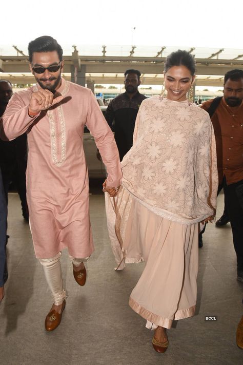 First pictures of Deepika and Ranveer post their Bangalore wedding reception Pics | First pictures of Deepika and Ranveer post their Bangalore wedding reception Photos | First pictures of Deepika and Ranveer post their Bangalore wedding reception Portfolio Pics | First pictures of Deepika and Ranveer post their Bangalore wedding reception Personal Photos - Times of India Photogallery अनारकली सूट, Deepika And Ranveer, Bangalore Airport, Virat Anushka, Us Couple, Deepika Ranveer, Indian Wedding Clothes For Men, Mens Indian Wear, Wedding Kurta For Men