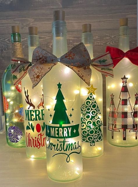 10 Best Christmas Prezzies That Are Fun To Give There are many ways to make your family happy. Give them a memorable gift. You don't need to spend a lot of your money if it's possible, but if it's a... Wine Bottle Crafts Cricut, Lighted Wine Bottles Christmas, Bottle Lights Ideas Diy Projects, Wine Bottle Christmas Crafts, Christmas Bottle Ideas, Christmas Wine Bottle Crafts Diy, Christmas Lights Bottle, Wine Bottle Fairy Lights, Christmas Bottles