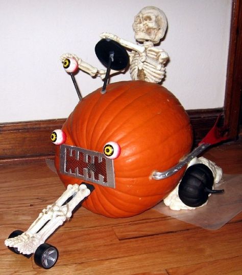 Pumpkin racer - no carving required Dirt Bike Pumpkin Carving, Pumpkin Race Ideas, Pumpkin Derby Ideas, Motorcycle Pumpkin Carving, Pumpkin Race Car Ideas, Prize Winning Pumpkin Carving, Horse Carved Pumpkin, Ffa Activities, Pumkin Designs