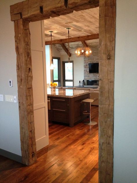 Frame your doorway in hand hewn beams and create an entrance no one will forget. Bloxburg Basement, Hand Hewn Beams, Western Kitchen, Bar Basement, Timber Beams, Rustic Doors, Basement Bathroom, Basement Remodel, Exposed Beams