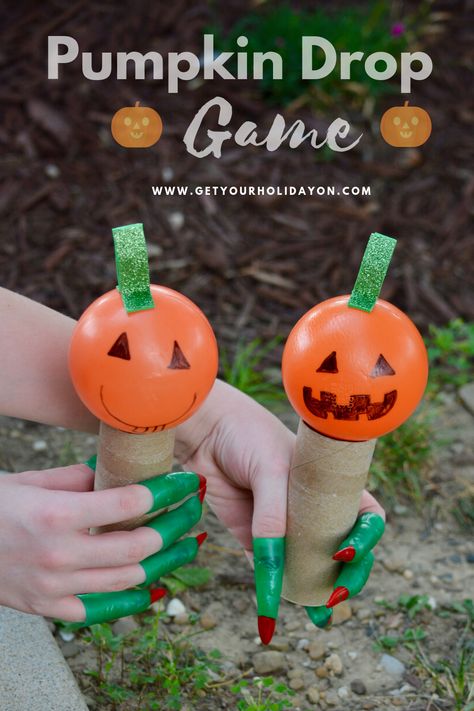 The best part about this Pumpkin Drop Minute To Win It game is you can choose to play it indoor or outdoor. It could be used for a Fall party game, at a carnival or festival, at a PTO party, Trunk or Treat, Girl Scout or Scouts camp, or even played in your backyard! #pumpkin #jackolantern #diycrafts #momlife Halloween Carnival Table Decorations, Indoor Carnival Games, Carnival Games For Adults, Indoor Carnival, Halloween Toddler Party, Fall Party Games, Fall Festival Games, Fall Dec, Fest Ideas