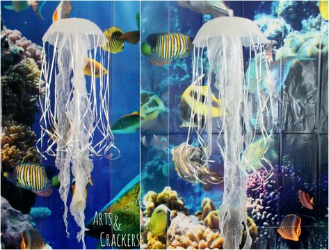 DIY Hanging Jellyfish Decoration | Ocean-Themed Party Decor Diy Jellyfish Decoration, Jellyfish Decoration, Underwater Theme Party, Ocean Theme Party Decorations, Ocean Party Decorations, Scuba Vbs, Hanging Jellyfish, Mystery Island, Diy Jellyfish