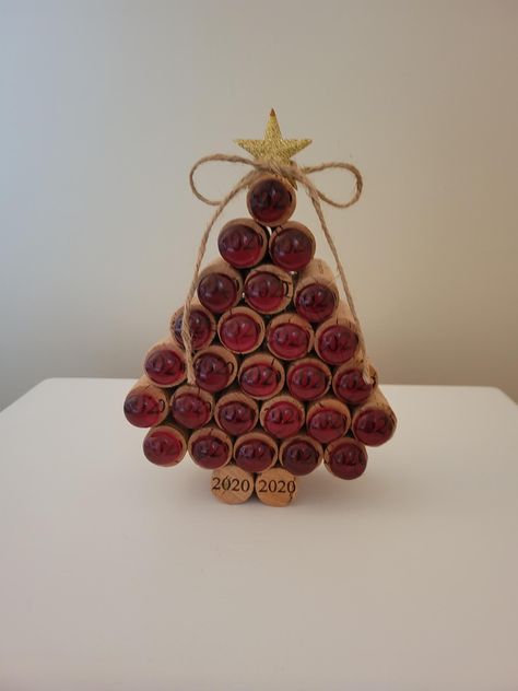 Add a unique & eco-friendly touch to your holiday decor with my gem wine cork Christmas tree. Crafted from repurposed wine corks, each tree is adorned with sparkling berry colored gems-like accents that will catch the light beautifully. Perfect for wine enthusiasts & those looking for a distinctive holiday crafted piece. This tree combines charm with festive elegance. Ideal for gift giving. Wine Christmas Decor, Wine Cork Flag, Cork Trees Christmas, What To Do With Corks, Wine Cork Christmas Crafts, Wine Cork Snowman, Cork Wreath Diy, Wine Cork Animals, Wine Cork Wall Decor