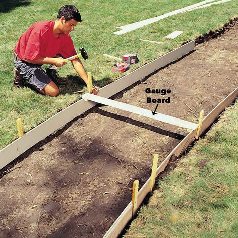 How to Pour a Concrete Sidewalk | The Family Handyman Outdoor Storage Locker, Small Outdoor Storage, Concrete Sidewalk, Hardboard Siding, Lawn Mower Storage, Concrete Walkway, Cement Siding, Garden Storage Shed, Deck Designs