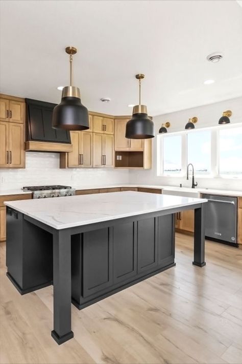 Black Hood Kitchen Modern, Light Wood Kitchen Cabinets Black Island, Two Tone Wood Cabinets Kitchen, Black Kitchen Island Brown Cabinets, Black Kitchen Island With Wood Cabinets, Black And Oak Cabinets, Cabinets To Go Kitchen, Wood Cabinets With Black Island, Kitchen With Dark Island