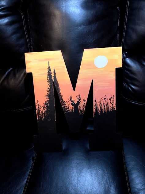 Letter M painting of a deer at sunset Painted Initial Letters, Wood Letter Painting Ideas Initials, Painted Letters Diy For Boys, Initial Painting On Canvas Letters, Painting Letters Ideas, Letter Painting Ideas, Letter Painting Ideas Wooden, Painted Letters Diy, Wooden Letter Painting Ideas