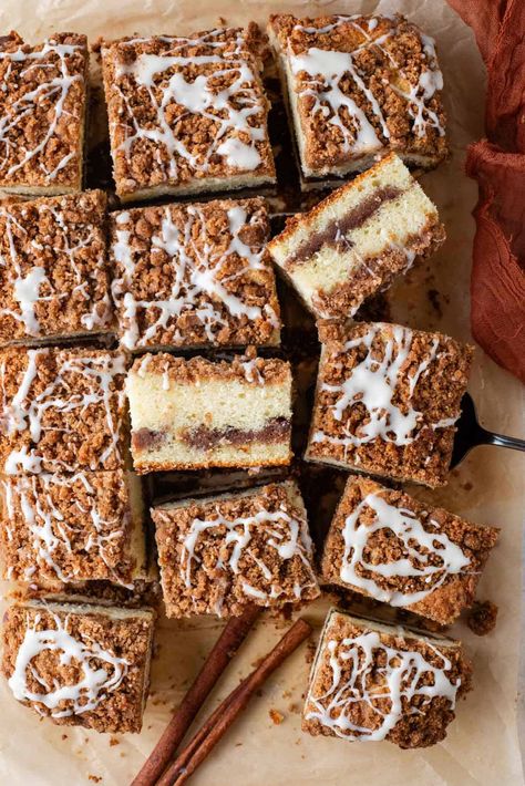 Once you make this incredibly moist coffee cake recipe the first time, it will be your go-to for life! With an irresistible crumb streusel topping and simple yet delicious glaze, this easy coffee cake recipe serves a crowd. The only problem is, once you taste it you won't want to share! Coffee Cake Squares, 9x13 Coffee Cake Recipes, Moist Cinnamon Streusel Pumpkin Coffee Cake, Cake Recipes Coffee, Coffee Cake 9x13, Easy Coffee Cake Recipes, Cinnamon Crumb Coffee Cake, Cinnamon Swirl Coffee Cake Loaf, Cinnamon Coffee Crumb Cake