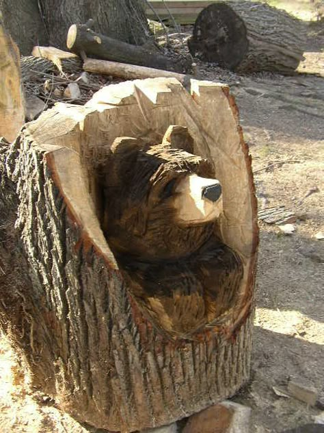 Chainsaw Art  thegardendiaries.wordpress.com Chainsaw Carving Patterns, Chain Saw Art, Chainsaw Wood Carving, Wood Bear, Chainsaw Art, Chainsaw Carvings, Woodworking Patterns, Bear Carving, Tree Carving