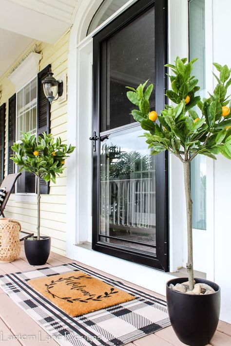 Front porch decor ideas for summer! I’m sharing how I dressed up my front porch this year with summer flowers, lemon trees, outdoor pillows and more Lemon Porch Decor Ideas, Lemon Tree Front Porch, How To Decorate Front Porch Steps, Lemon Tree On Balcony, Front Porch Decor Spring/summer, Fireplace Treatments, Cozy Porches, Decorating Porch, House Entryway