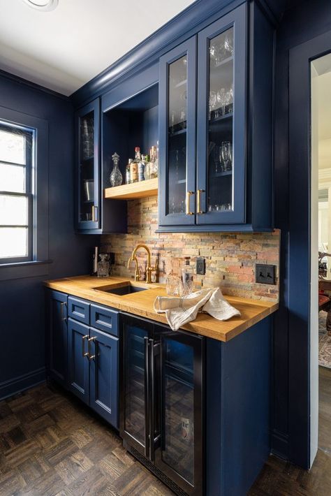 Navy home bar cabinet Wet Bar Ideas Butcher Block, Navy Blue Kitchen Cabinets Backsplash, Dark Blue Bar Cabinets, Navy Blue Kitchen Cabinets Brick Backsplash, Backsplash With Navy Cabinets, Blue Cabinets With Butcher Block Counter, Butcher Block Countertops Blue Cabinets, Blue Cabinets Butcher Block Counter, White Upper Cabinets Blue Lower