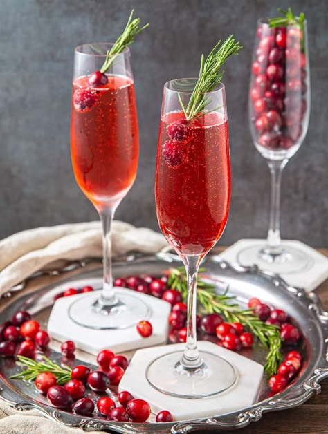 Poinsettia Cocktail ( Christmas Champagne Cocktail ) - Basil And Bubbly Poinsettia Punch Recipe Champagne, Poinsettia Drink Champagne, Pointsetta Cocktail, Christmas Champagne Glasses, Merry Dipmas, Christmas Horderves, Recipes With Champagne, Holiday Champagne Cocktails, Poinsettia Drink