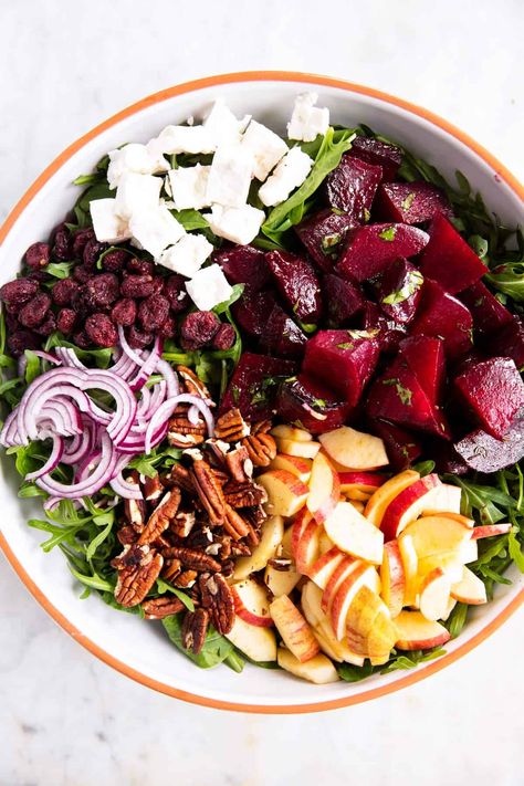 This Roasted Beet Salad with Goat's Cheese makes a festive addition to any special gathering or holiday dinner! The roasted beets, goat's cheese, apples and toasted pecans bring so many wonderful flavors and textures to this healthy side dish. With the homemade balsamic honey dressing, this tastes like the ultimate gourmet salad. | #holidaydinner #holidayside #saladrecipe #sidedish #sidedishideas #sidedishrecipe #easterdinner #easterrecipes #thanksgiving #thanksgivingdinner #beets Roasted Beet Salad With Goat Cheese And Pistachios, Beet Salad With Apples, Beet Pecan Salad, Toasted Beet Salad, Beet Blue Cheese Salad, High Protein Beet Salad, Salad With Beets And Goat Cheese, Beet And Apple Salad Recipes, Thanksgiving Beets Recipes