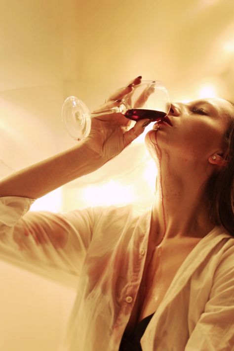 Pouring Alcohol Into Mouth Aesthetic, Woman Holding Glass Of Wine, Wine Stained Shirt Aesthetic, Drinking Wine Photoshoot, Woman Wine Photography, Women With Wine Photography, Sipping Wine Pose, Wine Portrait Photography, Person Drinking Wine Reference