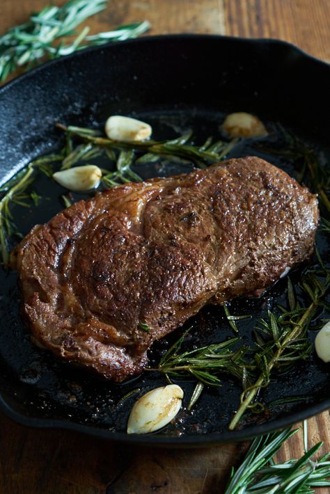 Quick and easy recipe for pan seared ribeye, comes out perfect every time. How to cook a steak on the stovetop and baste it with herb and garlic butter! Basted Steak, Iron Skillet Steak, How To Cook Ribeye, Cast Iron Skillet Steak, Baked Brisket, Grilling Steaks, Boneless Ribeye Steak, Steak At Home, Cast Iron Steak