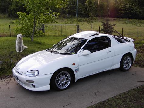 a mazda mx-3 gs i used to own. it had a v6, black leather, infinity speaks, sun roof and it was quick. one of the best cars ive ever owned. RIP. Mazda 3 Hatch, Mazda Mx3, Dream Vehicles, Sun Roof, Best Cars, Nice Cars, Mazda Mx, Pretty Cars, Love Car