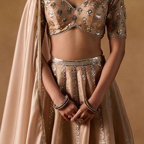 NOORE| Formals | Suno Saheli Description:- Our Gold color Tissue Lehenga is the epitome of glamour and grace. Featuring a tissue organza top with a satin inner, a flowing lehenga, and a matching dupatta, this ensemble is designed to dazzle. The intricate work—sequins, thread, traditional zari, and hand-crafted embellishments—adds a stunning sparkle. Made in Pakistan and meticulously hand-checked for exceptional quality, this lehenga ensures you shine bright on any occasion. Color: Gold Fabr... Tissue Organza Lehenga, Tissue Lehenga, Organza Top, Shine Bright, Lehenga, Gold Color, Pakistan, Embellishments, Hand Crafted