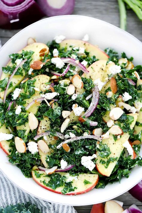 This Kale Salad with Apples and Goat Cheese is massaged with a sweet and tangy maple vinaigrette to soften the kale and remove all bitterness- this recipe will turn anyone into a kale lover! Kale Goat Cheese Salad, Kale Salad With Apples, Salad Apple, Massaged Kale Salad, Salad With Apples, Maple Vinaigrette, Massaged Kale, Kale Salad Recipes, Grape Salad