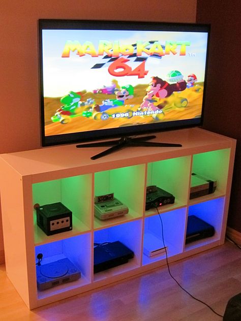 I modified an Ikea bookshelf to make a console cabinet. Very happy with the finished product! - Imgur Unique Man Cave Ideas, Video Game Storage, Mancave Garage, Diy Projects For Bedroom, Man Cave Basement, Ikea Bookshelves, Game Storage, Video Game Rooms, Diy For Men