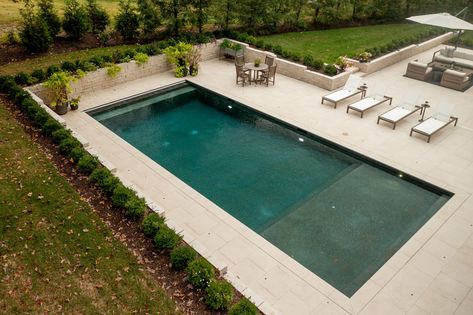 Rectangular Pool with Large Tanning Shelf and Autocover - St. Louis' Premier Pool Company Rectangular Pool With Sun Shelf, Vinyl Liner Pool With Tanning Ledge, Rectangle Pool With Spa And Sun Shelf, Rectangle Pool With Tanning Ledge, Pool With Hot Tub And Tanning Ledge, Rectangle Pool Ideas, Rectangle Pool Designs, Rectangle Pool With Spa, Modern Rectangle Pool