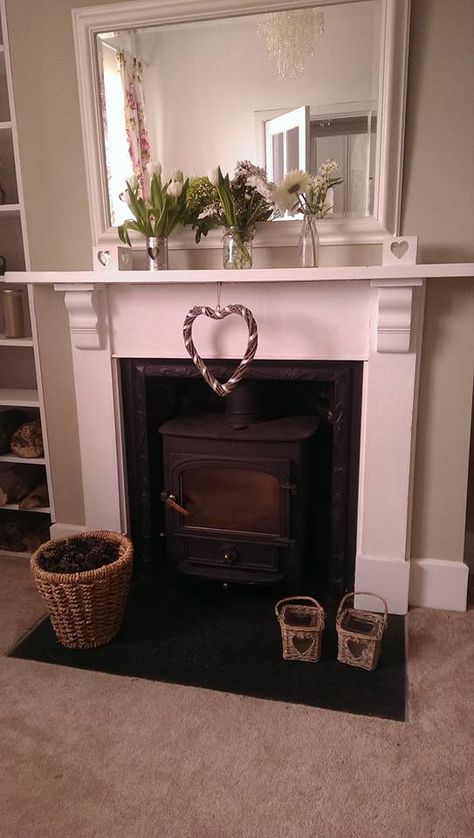 This is my White fire surround with log burner..There's nothing quite like lighting it in cold winter months. - Sally White Fire Surround, White Shelf, Fire Surround, Cosy Living, Cosy Living Room, White Shelves, Log Burner, My Living Room, Winter Months