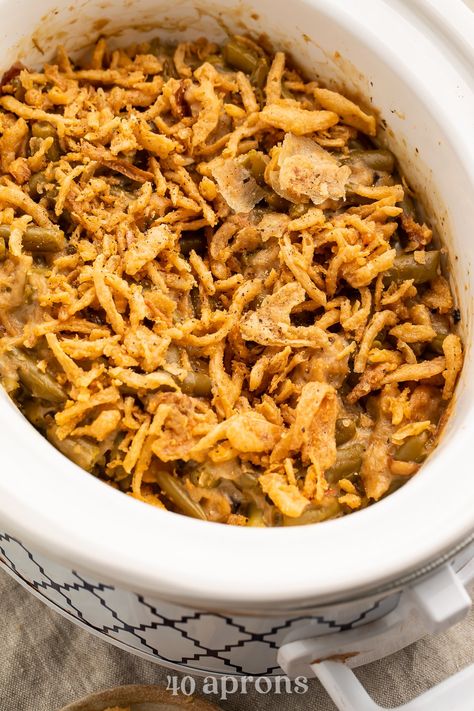 The only thing better than green bean casserole is a Crockpot green bean casserole! This slow cooker version of that quintessential holiday side dish is every bit as delicious as a traditional casserole, but frees up much-needed oven space. Prep it early in the day and save yourself a little of that last-minute frenzy! Stovetop Green Bean Casserole, Crock Pot Green Bean Casserole, Crockpot Green Bean Casserole, String Bean Casserole, Crockpot Green Beans, Green Bean Casserole Crock Pot, Traditional Green Bean Casserole, Sausage And Kale Soup, Classic Green Bean Casserole