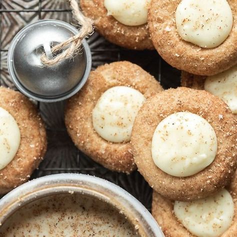 anita parris soule on Instagram: "Eggnog Snickerdoodle Thumbprint Cookies✨ A soft cinnamon sugar cookie filled with eggnog ganache (spiked with rum! Optional but so good!) and topped with freshly grated nutmeg. These are for the eggnog lovers 🙋🏻‍♀️ and make such a perfect addition to a holiday cookie box🎄 https://wildthistlekitchen.com/eggnog-snickerdoodle-thumbprint-cookies/ #christmascookies #eggnog #eggnogcookies #bakefromscratch @food52 #holidaybaking #cookies #christmasbaking #f52grams" Eggnog Ganache, Eggnog Cookies, Cinnamon Sugar Cookies, Thumbprint Cookies, Holiday Cookie, Cookie Box, Snickerdoodles, Cinnamon Sugar, Food 52