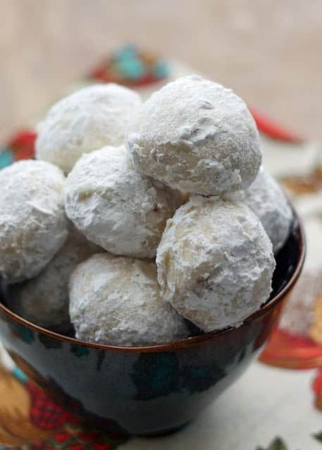 Mexican Wedding Cookies, Russian Tea Cakes, Sugar Butter Balls, Polvorones, Snowball Cookies, Egyptian Feast Cookies, Nut Butter Balls, Norwegian Snowballs, Kourambie, Walnut Delights, Pecan Petites, Holiday Nuggets, Swedish Heirloom Cookies, these melt-in-your-mouth cookies are known by many different names around the world. Get the recipe at barefeetinthekitchen.com Mexican Christmas Cookies, Mexican Wedding Cookies Recipes, Wedding Cookies Recipe, Russian Tea Cake, Princess Pinky Girl, Pinky Girl, Mexican Wedding Cookies, Mexican Christmas, Snowball Cookies